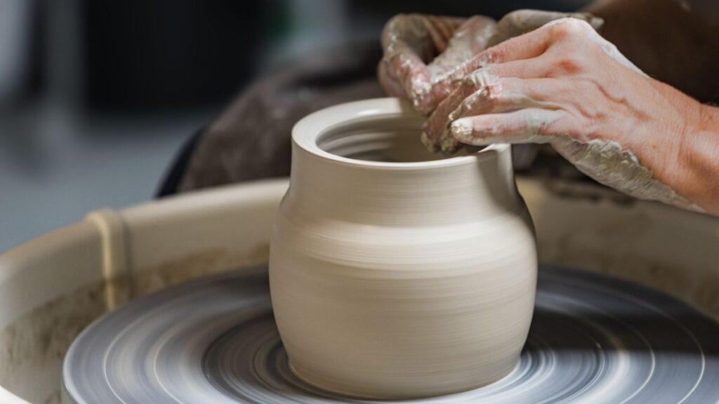 A person practicing pottery