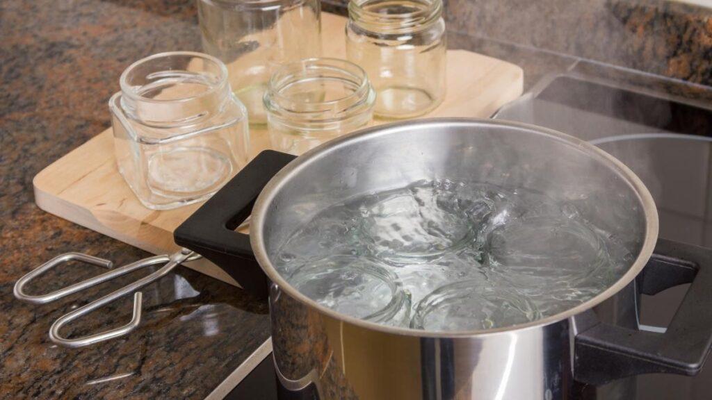 Boiling glass jars to sterilize them