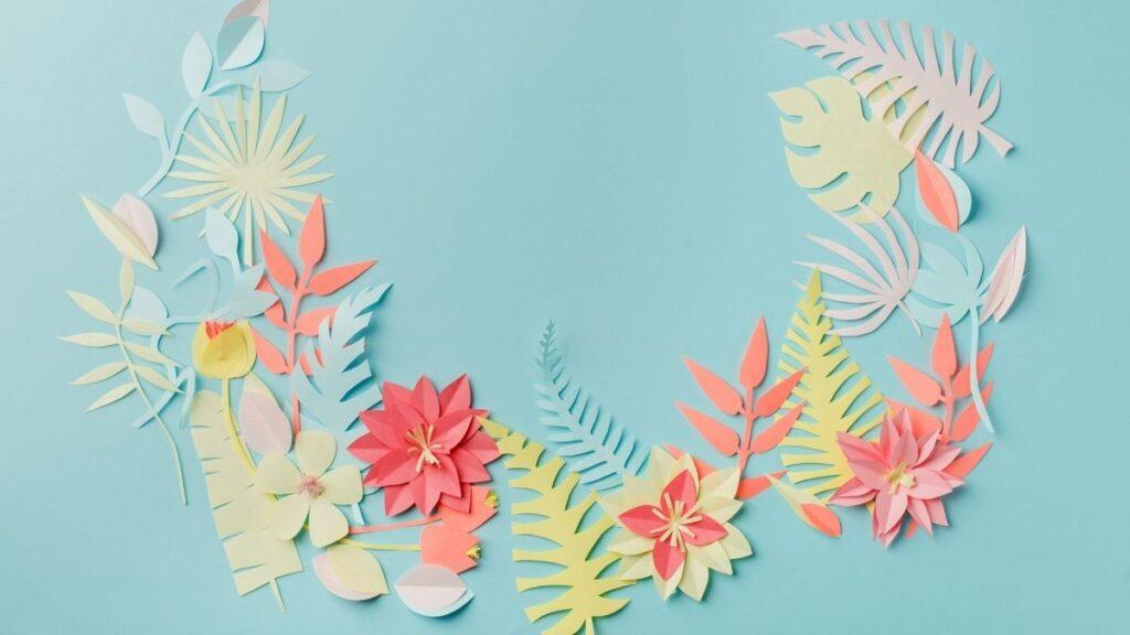Paper crafted into flowers and leaf shapes