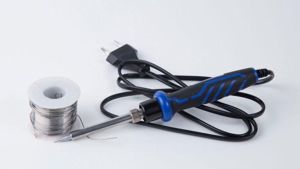 Soldering iron with solder wire