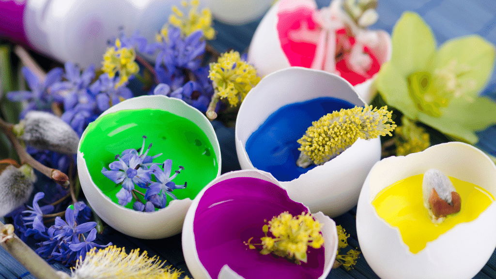 cracked egg shells filled with paint and flowers